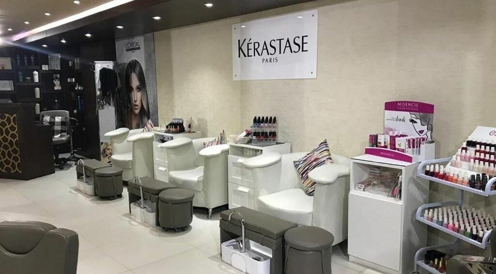 Modern salon interior with nail stations at Salon Dye and Dry, Abu Dhabi, Abu Dhabi, AE.