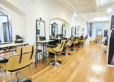 Contemporary salon chairs at StyleLab Hair, Sydney, New South Wales, AU with modern decor and mirrors.