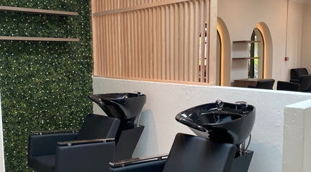 Chic wash stations at Natural Hair Lounge, Randburg, Gauteng, ZA. Elegant design with a serene ambiance.