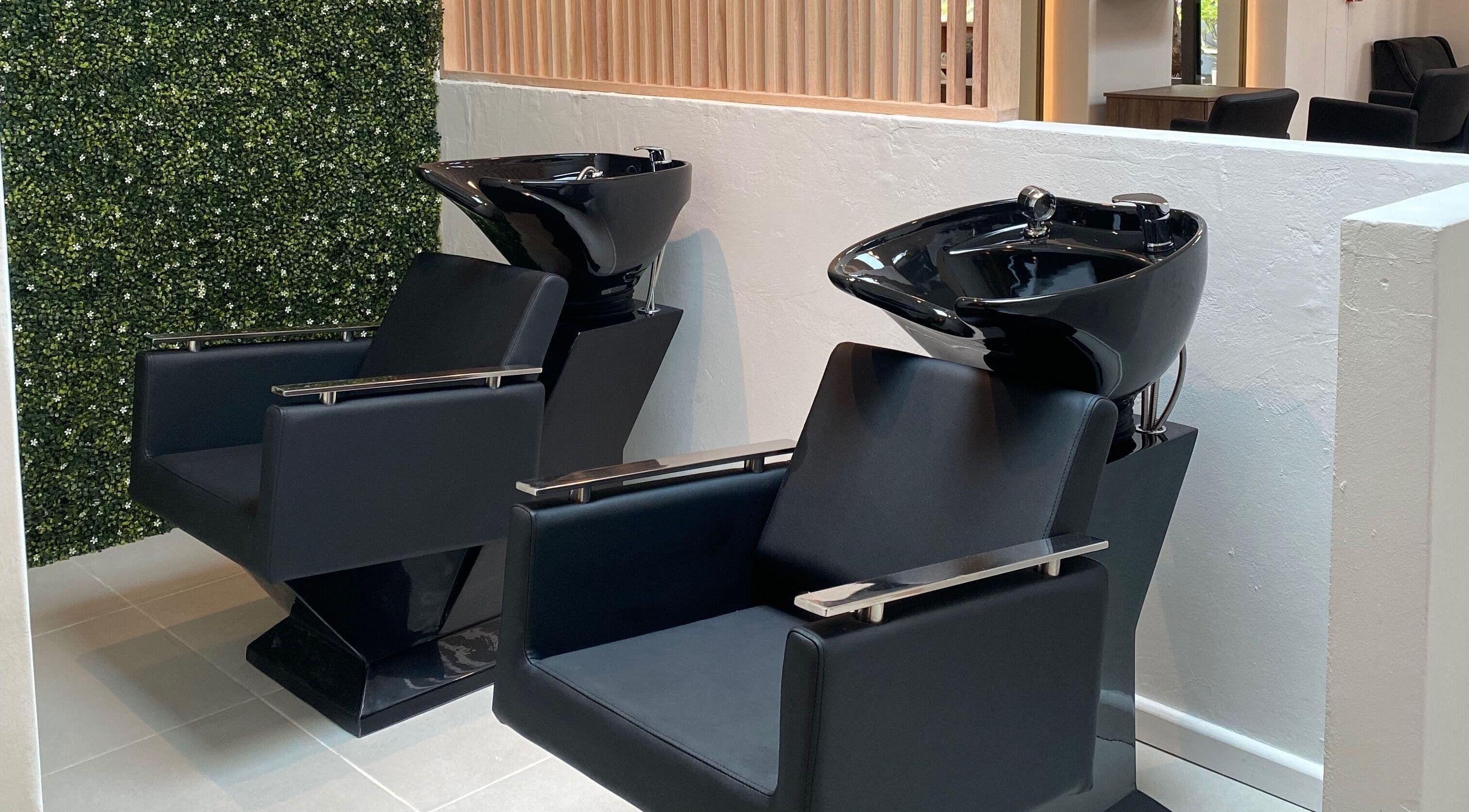Chic hair wash stations at Natural Hair Lounge, Randburg, Gauteng, ZA, designed for comfort and style.