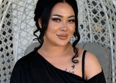 Smiling woman in chic makeup at Nadya Beauty Studio, Blair Athol, South Australia, AU.