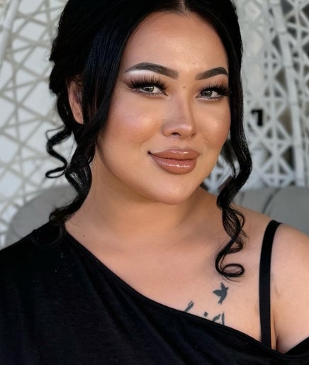 Smiling woman in chic makeup at Nadya Beauty Studio, Blair Athol, South Australia, AU.