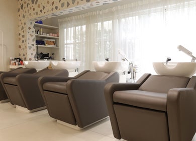Luxurious wash stations at Essential Beauty Salon, Dubai, Dubai, AE, offering premium beauty services.