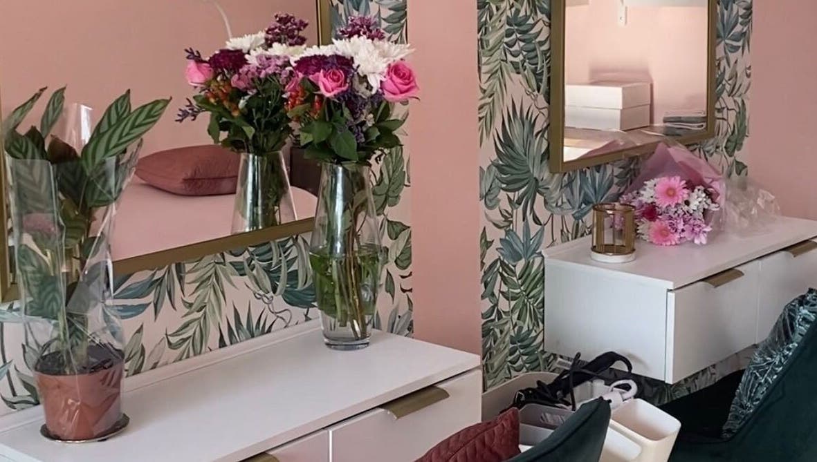 Elegant floral decor at Made Up Salon in Rochester, England, GB, featuring vibrant flowers and chic design.