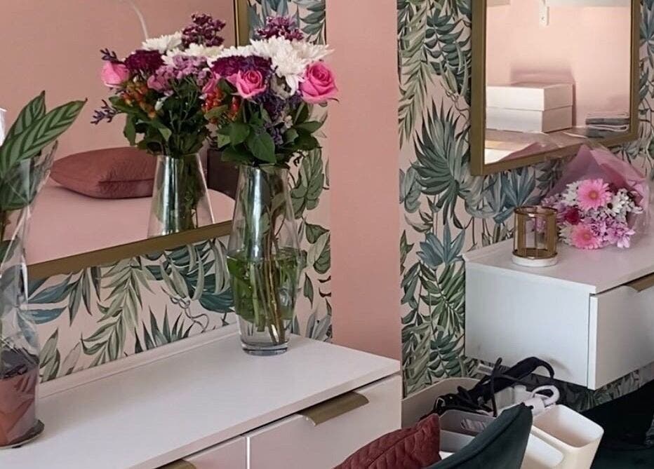 Elegant floral decor at Made Up Salon in Rochester, England, GB, featuring vibrant flowers and chic design.