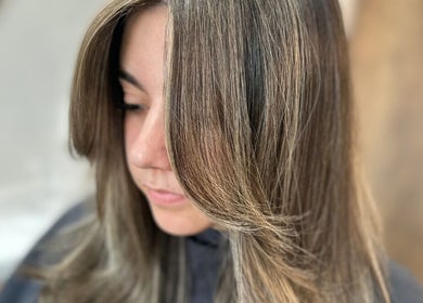 Stylish hair highlighting by J Fernandez Hair in Melbourne, Victoria, AU. Showcasing smooth brown tones.
