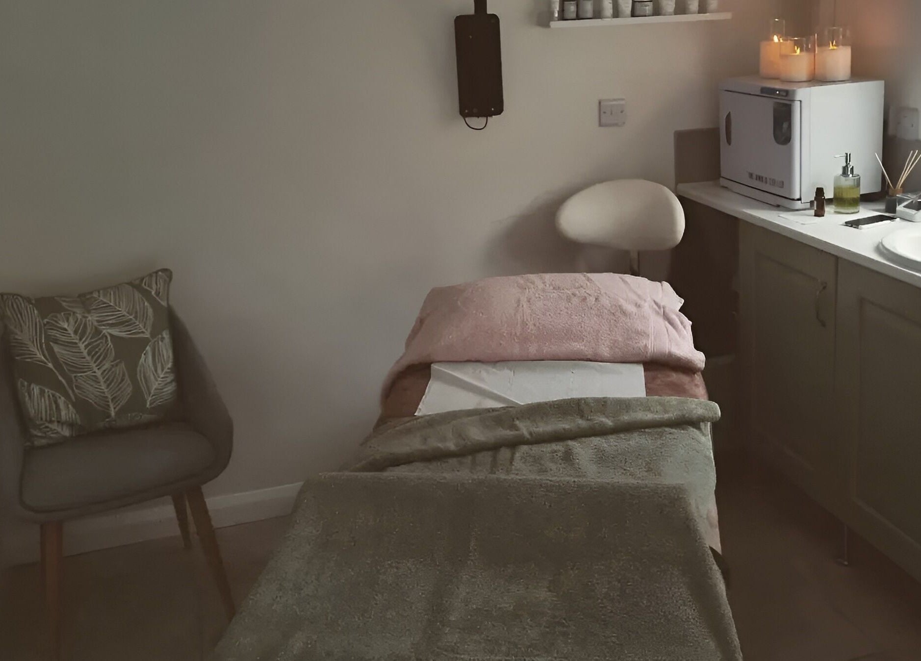 The Rose Room spa bed and candles in Westergate, England, GB offer a peaceful wellness retreat.