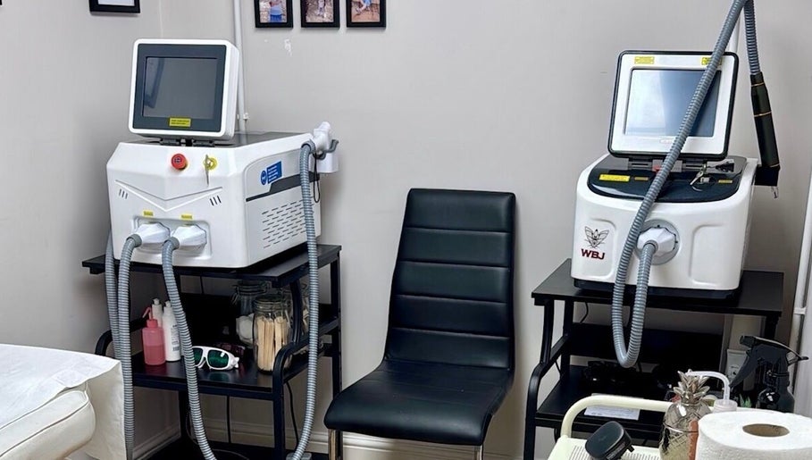 Interior of ER Laser Clinic & Piercing, featuring advanced laser machines, Wisbech, England, GB.