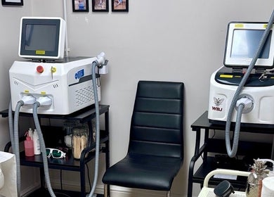 Interior of ER Laser Clinic & Piercing, featuring advanced laser machines, Wisbech, England, GB.