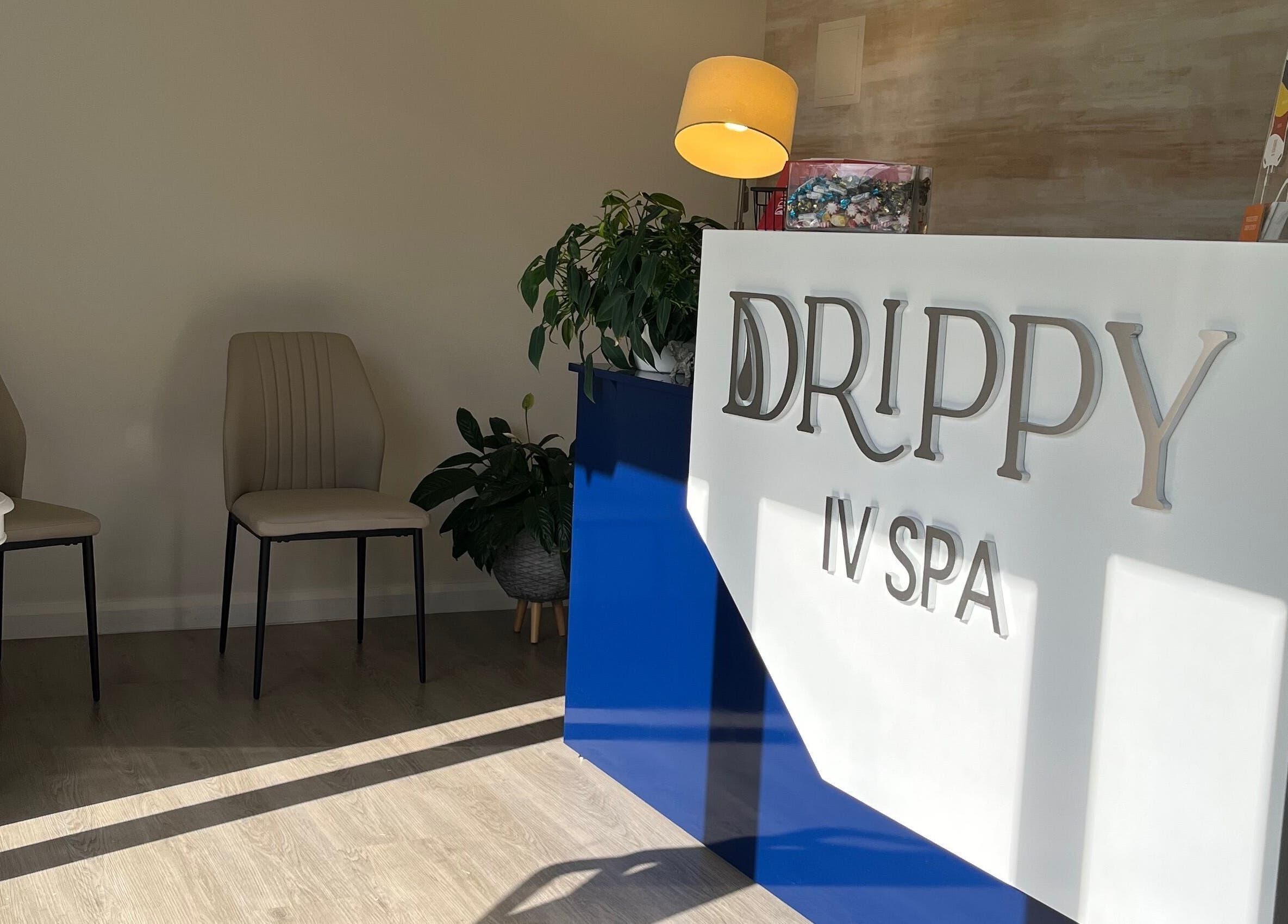 Drippy IV Spa's welcoming reception area in Westmoorings, TT with chic decor and seating.