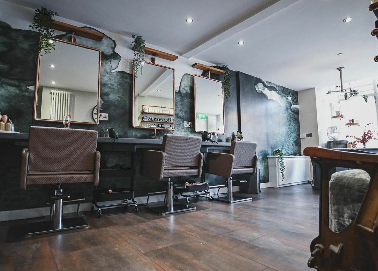 Modern salon interior at Oliver's Hair Studio Limited in Belper, England, GB.
