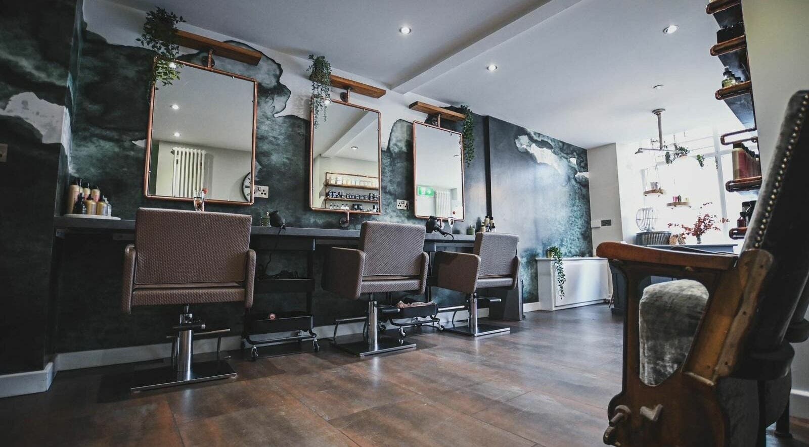 Modern salon interior at Oliver's Hair Studio Limited in Belper, England, GB.