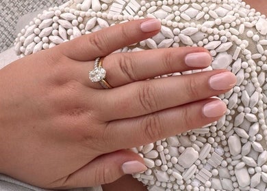 Close-up of manicured hand with ring at Mimi-Jo Beauty, Scarborough, England, GB.