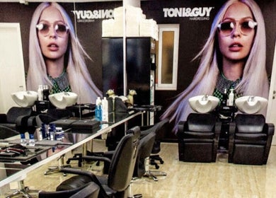 Modern salon interior at TONI&GUY Ibrag, Is-swieqi, MT with stylish decor and professional setup.