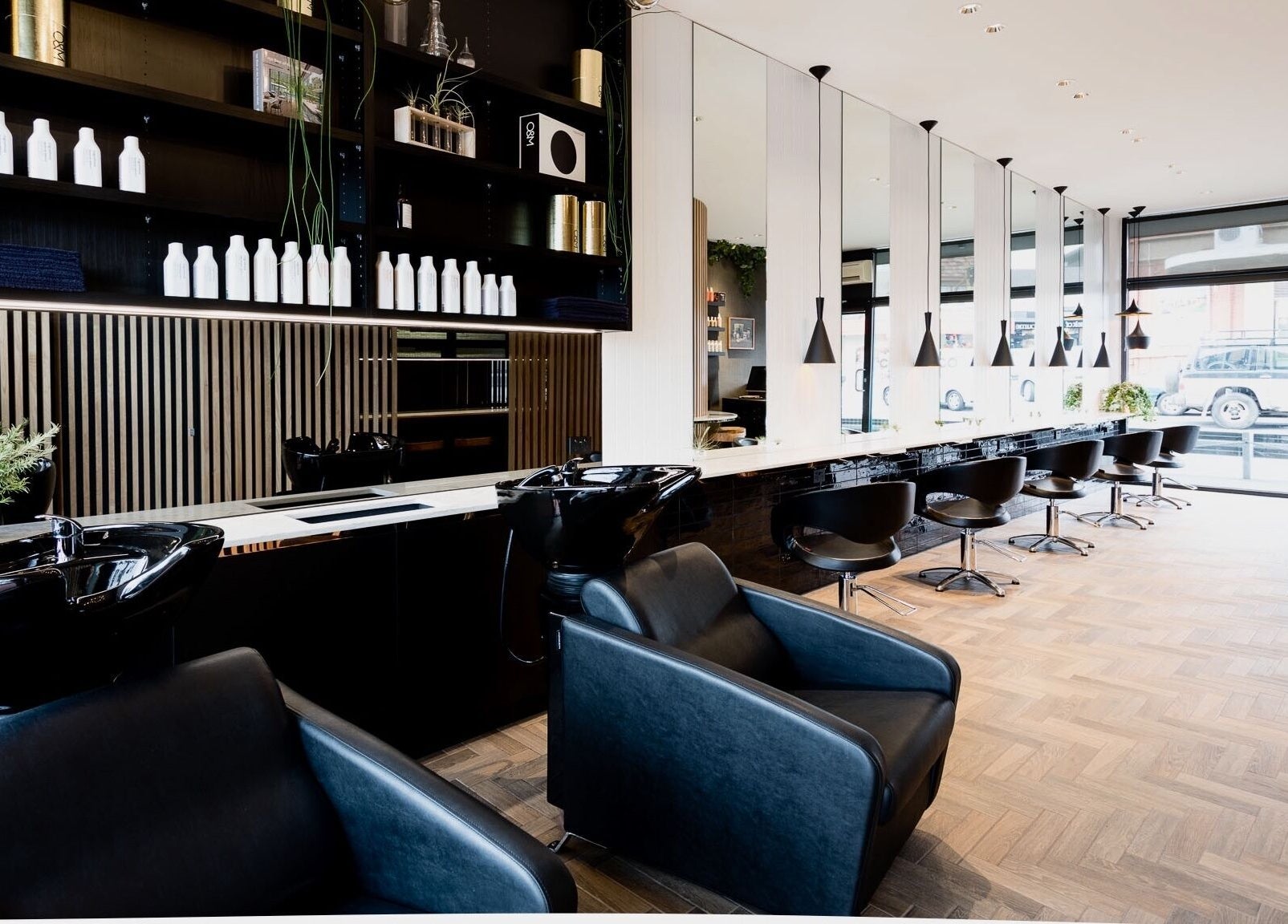 Modern salon interior at Covet & Co, Melbourne, Victoria, AU with sleek chairs and stylish decor.