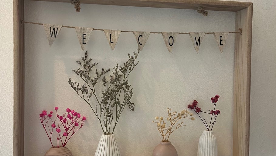Welcome sign with dried flowers at Nicole Whitney’s Beauty & Spa treatments, Sileby, England, GB.