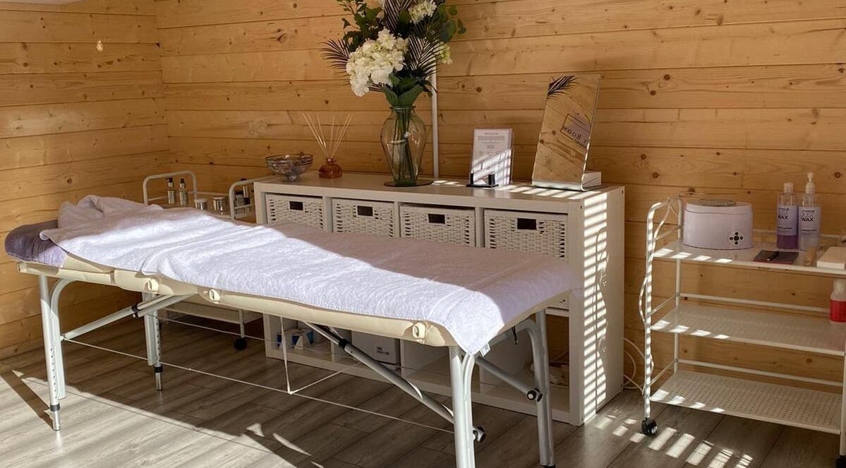 Relaxing treatment room at Gem's Beauty Room, Wantage, GB, with serene decor and comfortable massage table.