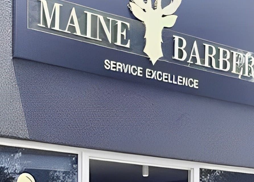 Maine Barber's elegant signage at Centurion, Gauteng, ZA. Showcases premium barber services.