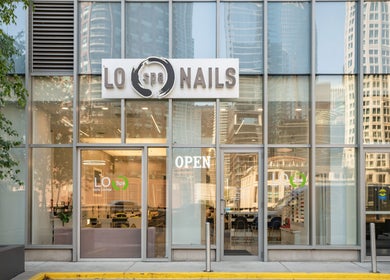 Front view of LO Spa & Nails at Lakeshore East, Chicago, Illinois, US, showcasing modern glass facade.