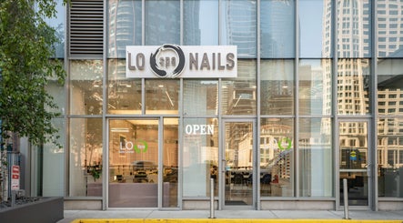 Front view of LO Spa & Nails at Lakeshore East, Chicago, Illinois, US, showcasing modern glass facade.