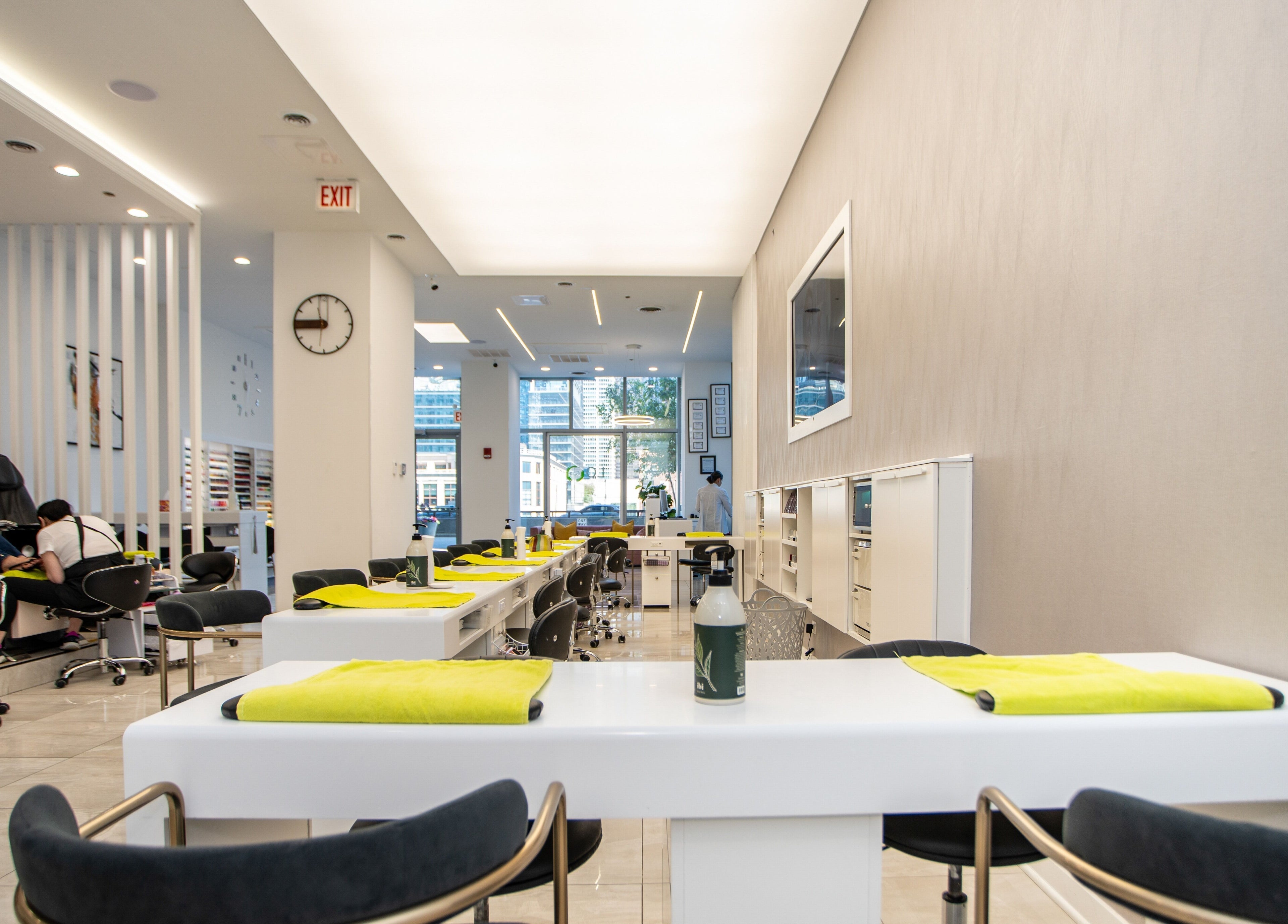 Interior of LO Spa & Nails at Lakeshore East, Chicago, Illinois, US, showcasing modern nail stations and serene decor.