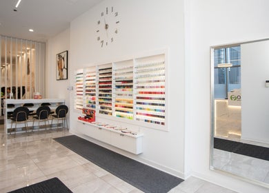 Bright nail polish display at LO Spa & Nails at Lakeshore East, Chicago, Illinois, US.