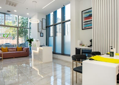 Interior of LO Spa & Nails at Lakeshore East, Chicago, Illinois, US. Modern, inviting design with large windows.