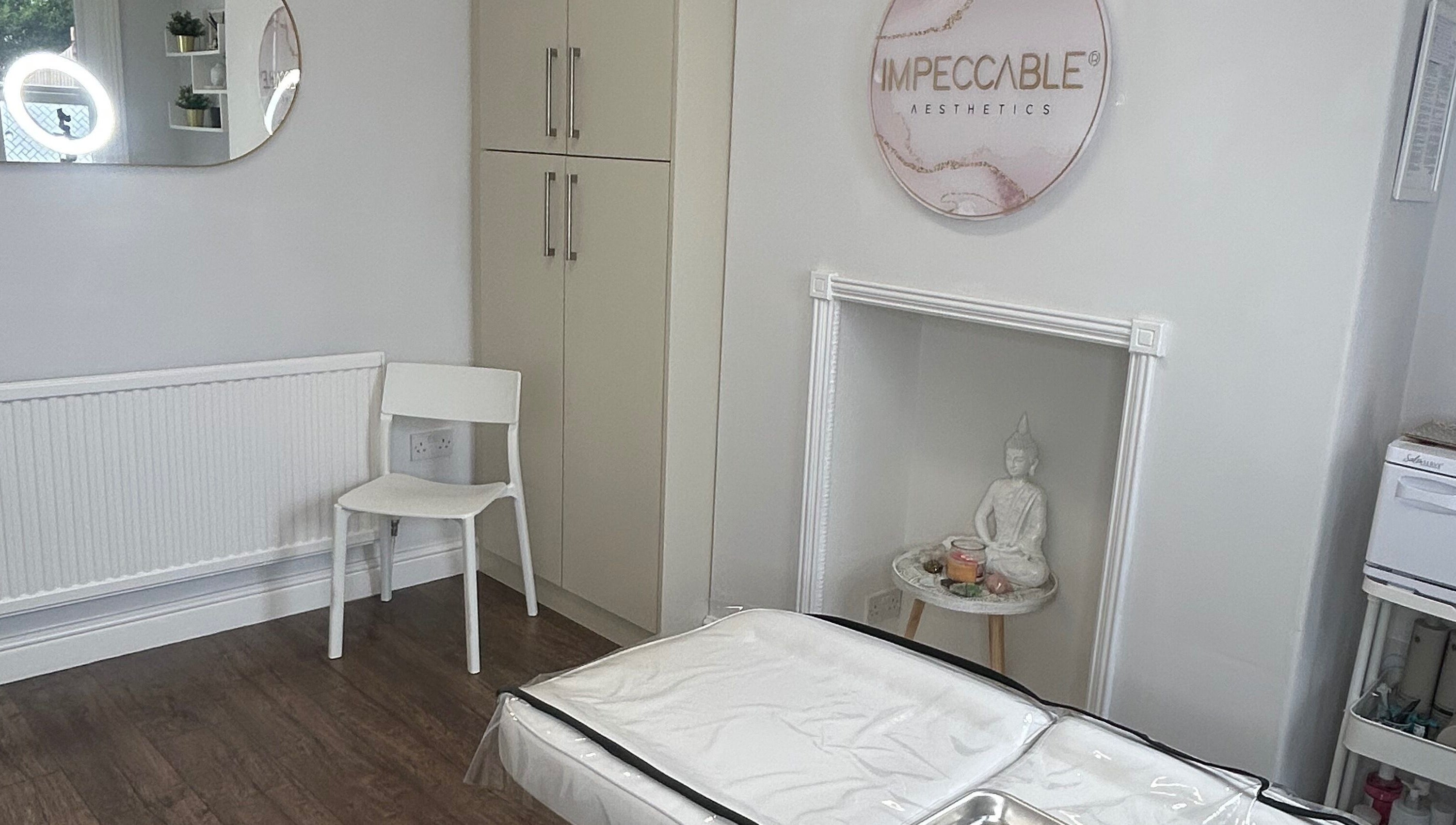 Calm treatment room at Impeccable Aesthetics in Warrington, England, GB with elegant decor.