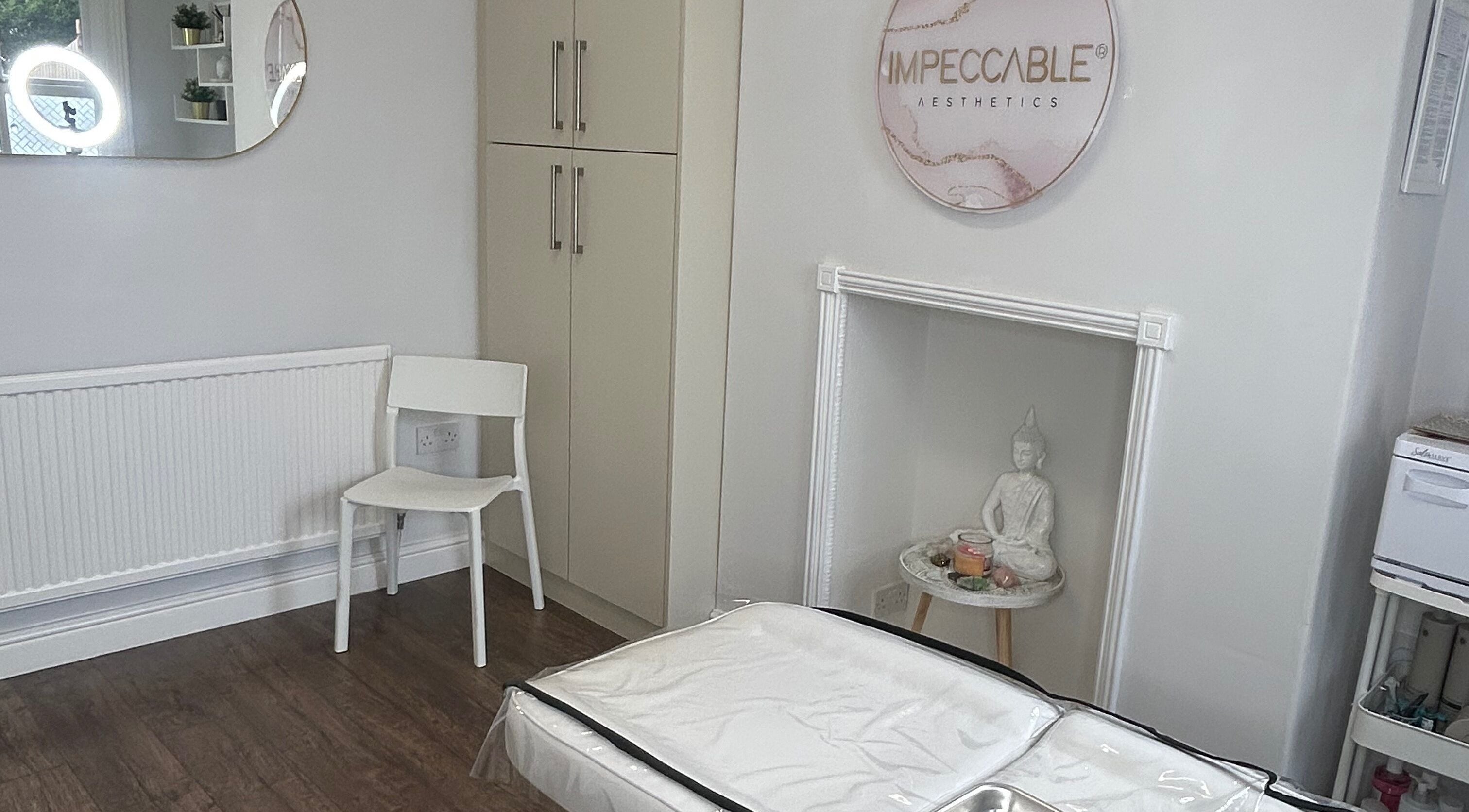Calm treatment room at Impeccable Aesthetics in Warrington, England, GB with elegant decor.