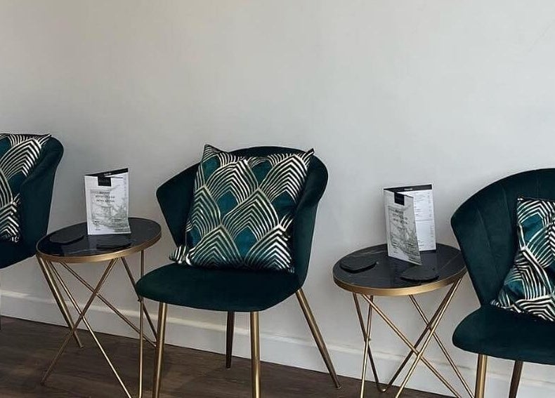 Chic seating area at Black Ivy in Swanley, England, GB with modern decor and stylish cushions.