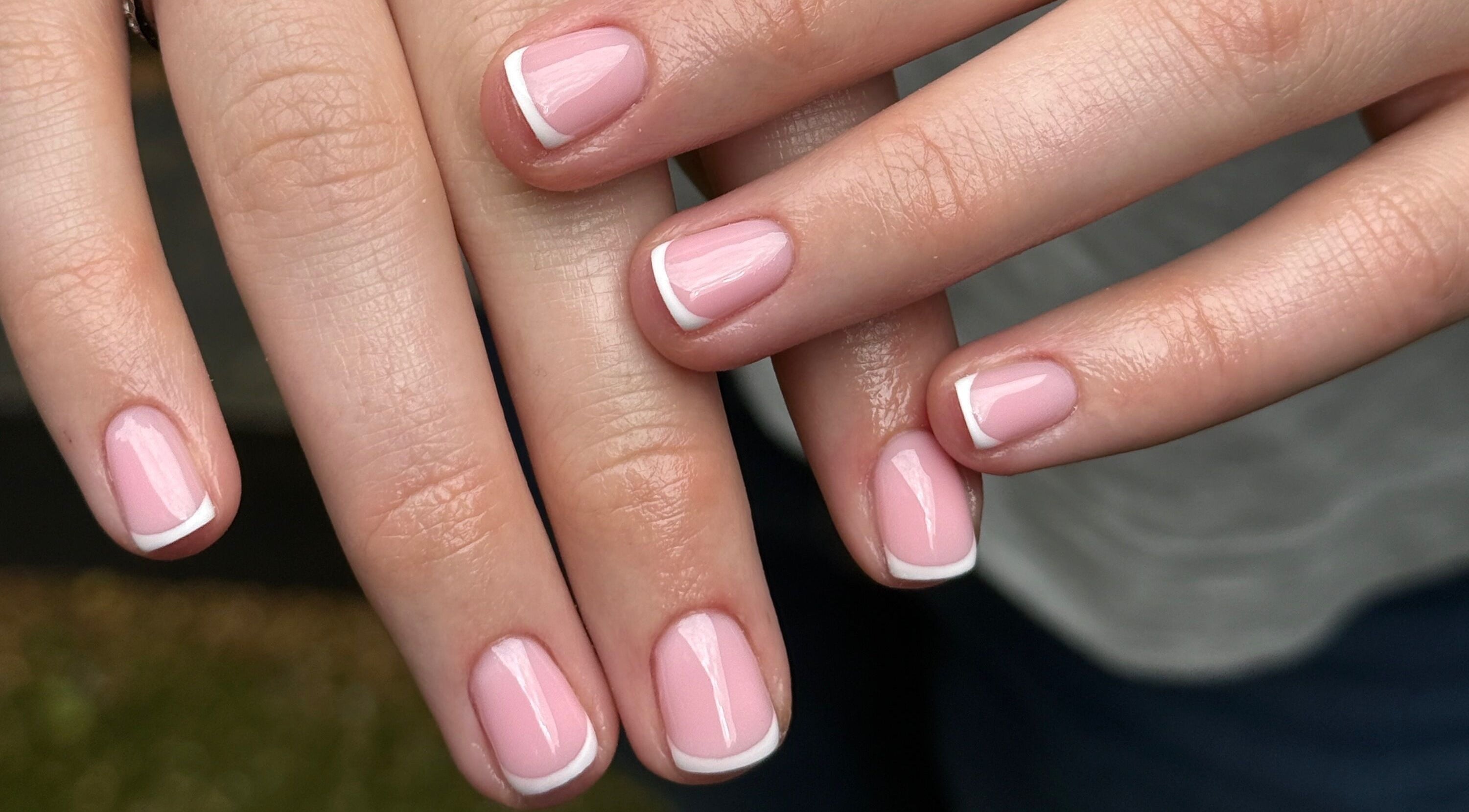 Perfect French manicure at STELLO Beauty Bar, West Dunbartonshire, Scotland, GB showcases expert nail art.