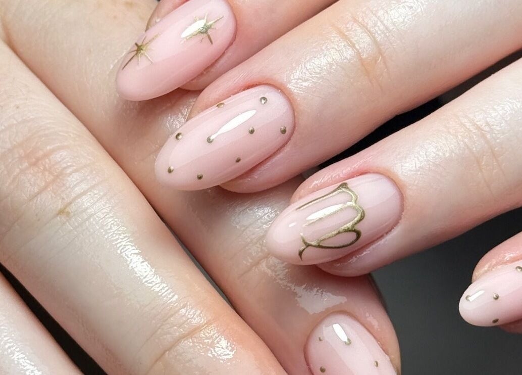 Elegant nail art at STELLO Beauty Bar, West Dunbartonshire, Scotland, GB. Features delicate designs and glossy finish.