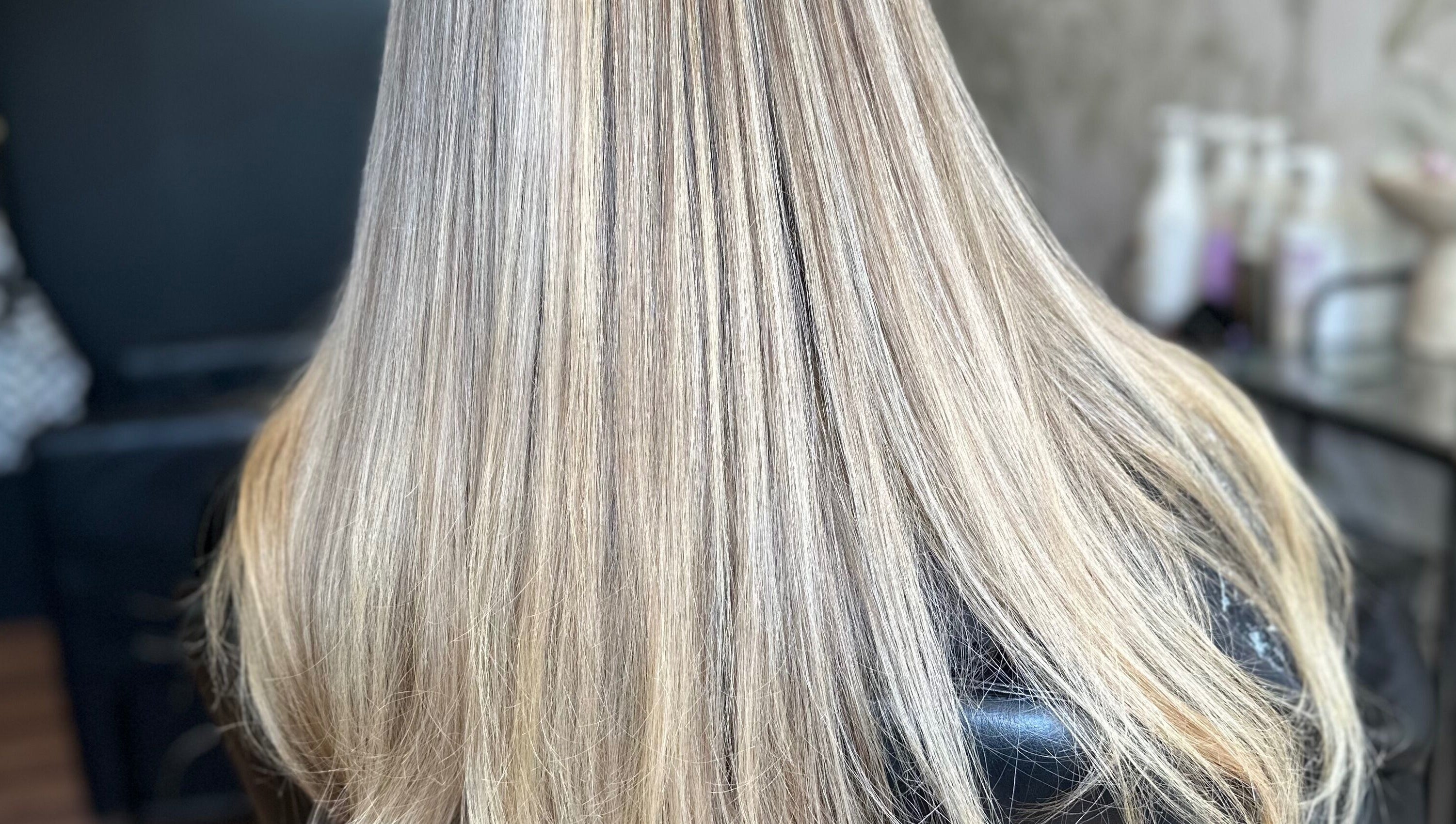 Gleaming blonde hair at HÉLI Studio Helensvale, Helensvale, Queensland, AU, showcasing expert styling.