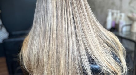 Gleaming blonde hair at HÉLI Studio Helensvale, Helensvale, Queensland, AU, showcasing expert styling.