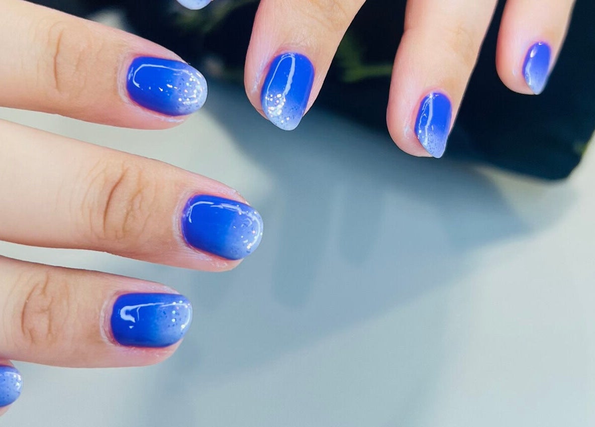 Stylish blue gradient nails at Luxury Spa, Al Qatif, Eastern Province, SA offering expert nail care.