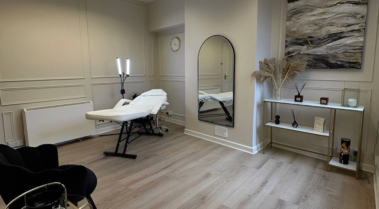 Modern treatment room at The Lash Link in Hazel Grove, England, GB featuring a luxury aesthetic bed and decor.
