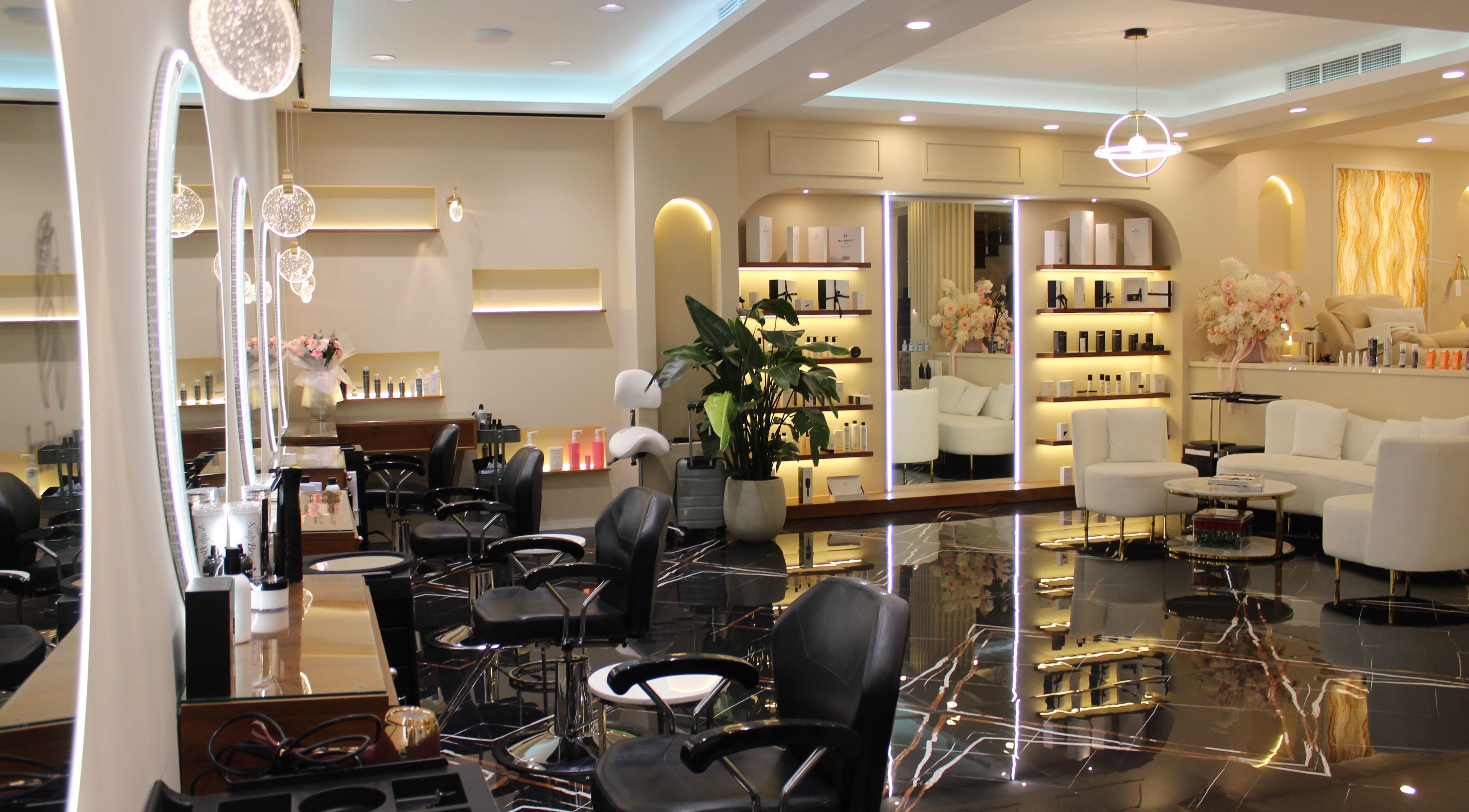 Chic interior of InnBeauty Space - Jumeirah, Dubai, AE featuring elegant salon chairs and modern decor.