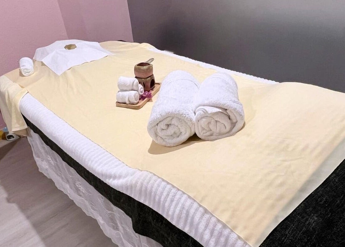 Massage bed setup with towels at Clover Grand Therapeutic Massage Clinic, Forestville, New South Wales, AU.
