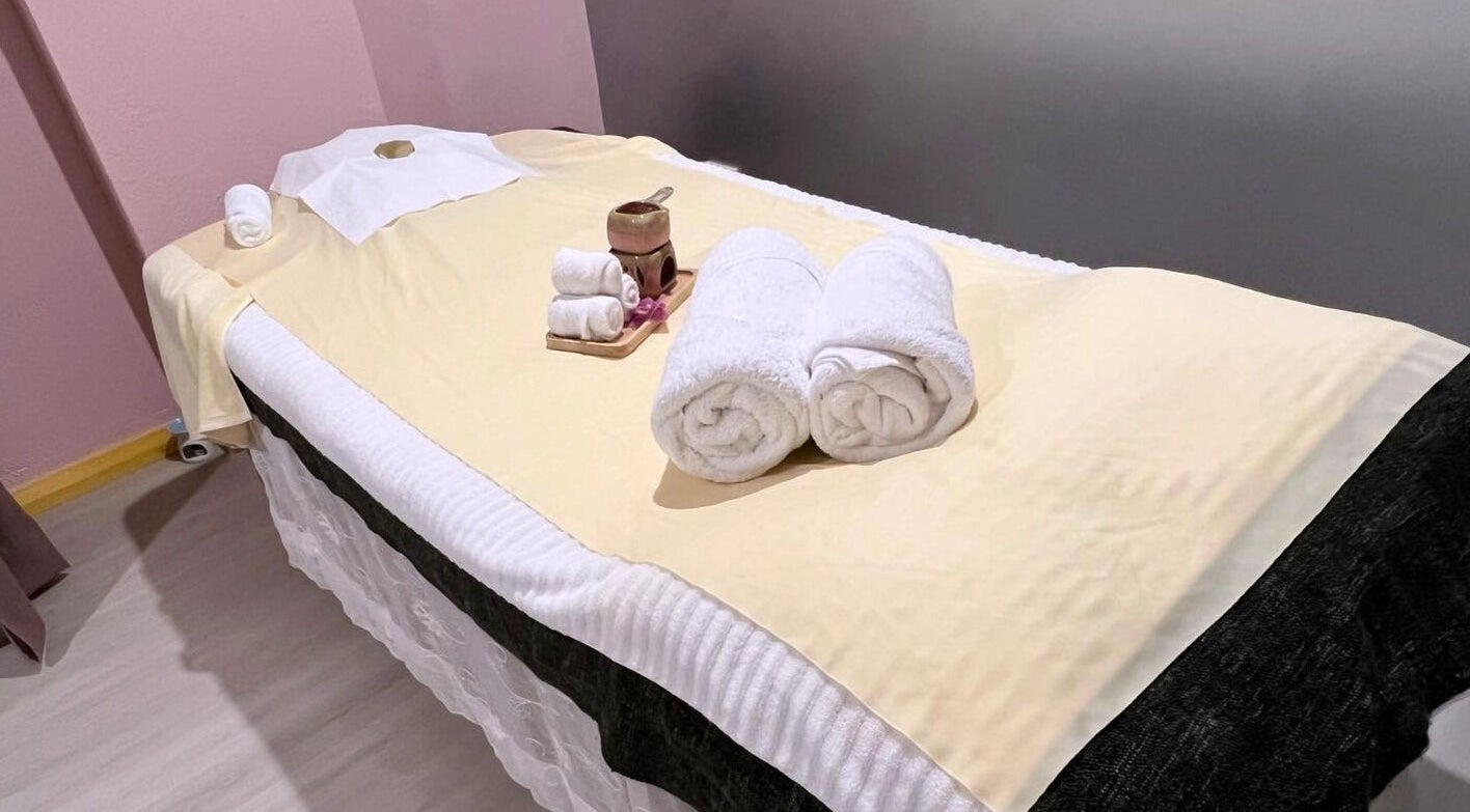 Massage bed setup with towels at Clover Grand Therapeutic Massage Clinic, Forestville, New South Wales, AU.