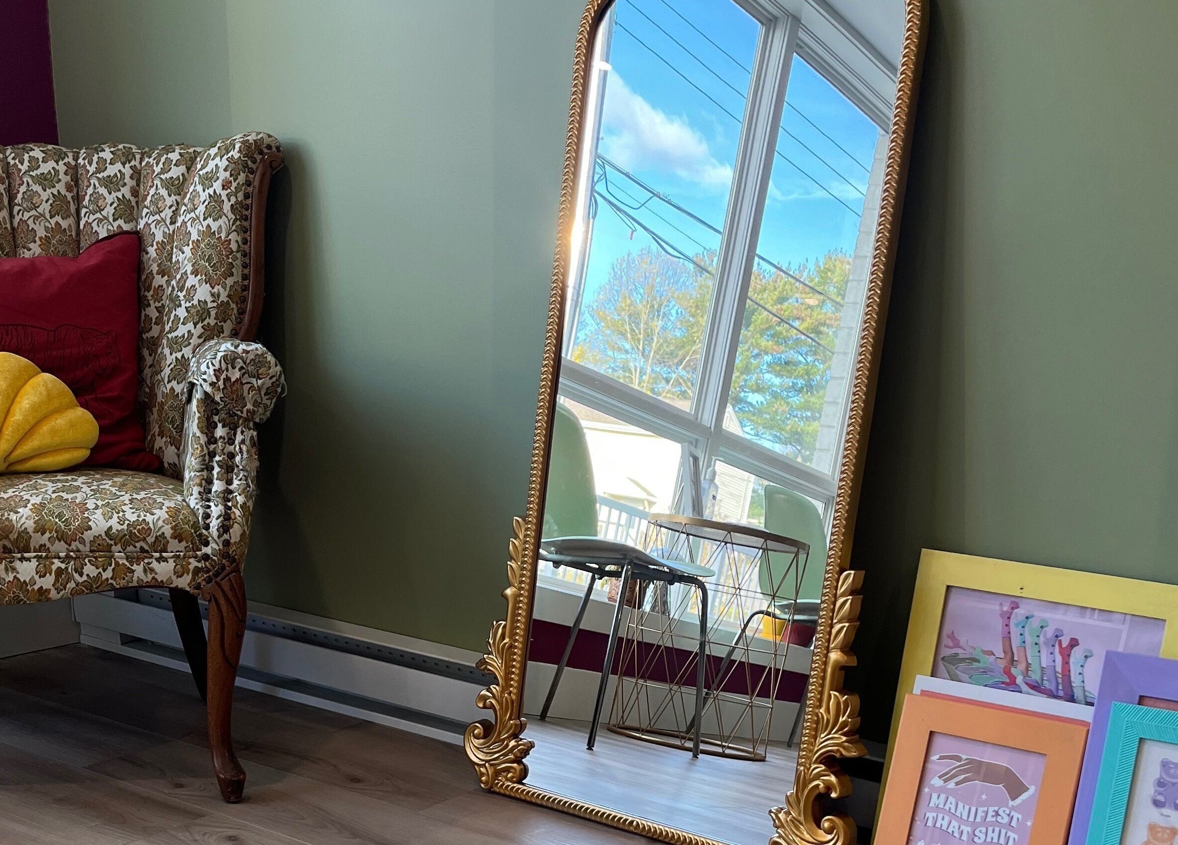Elegant vintage chair and ornate mirror at Good Karma Studios, Lower Sackville, Nova Scotia, CA.