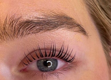 Close-up of eyebrow and lashes styled at Bombshell Studio in Cape Town, Western Cape, ZA.