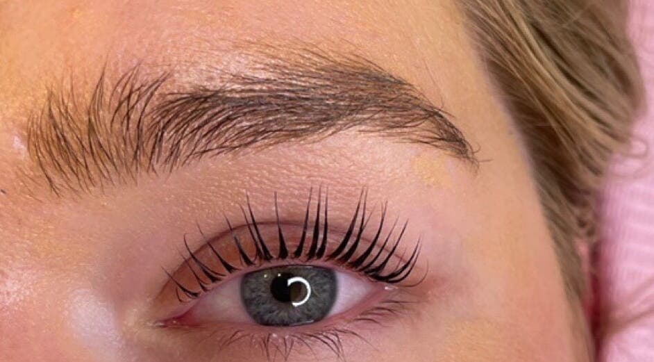 Close-up of eyebrow and lashes styled at Bombshell Studio in Cape Town, Western Cape, ZA.