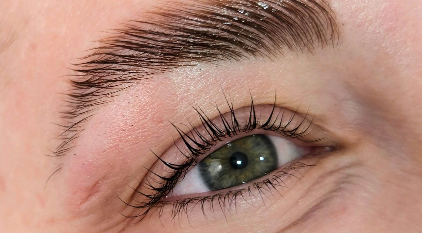 Close-up of perfectly groomed eyebrow and eyelashes at Whisk Beauty, Blenheim, Marlborough, NZ.