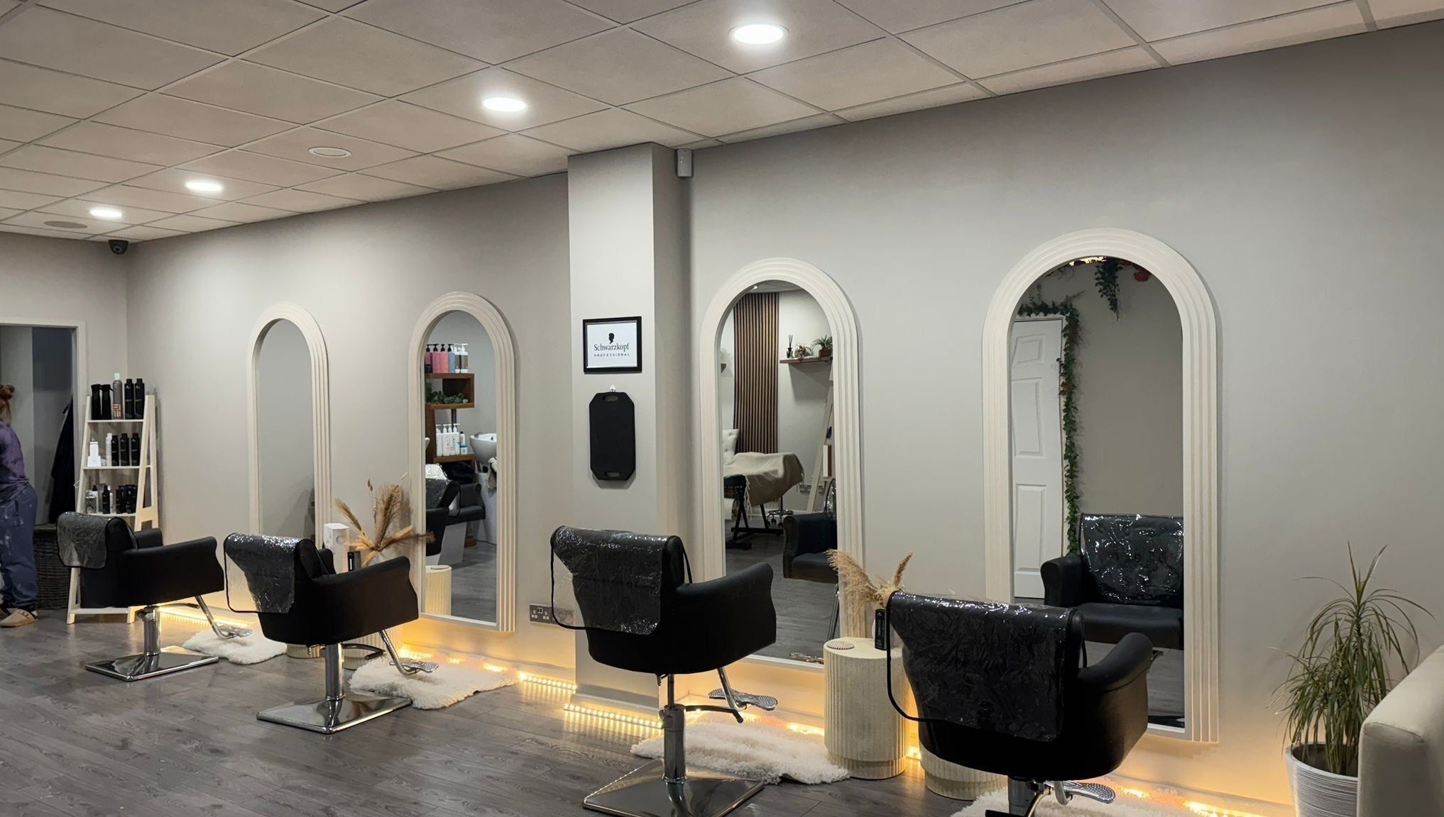 Elegant salon chairs and mirrors at House Of Serenity, Ferring, England, GB, offering a tranquil beauty experience.