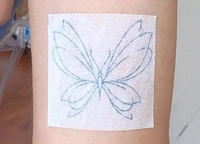 Butterfly tattoo stencil on skin at Thi Aim, Richmond, South Australia, AU. Modern tattoo art in progress.
