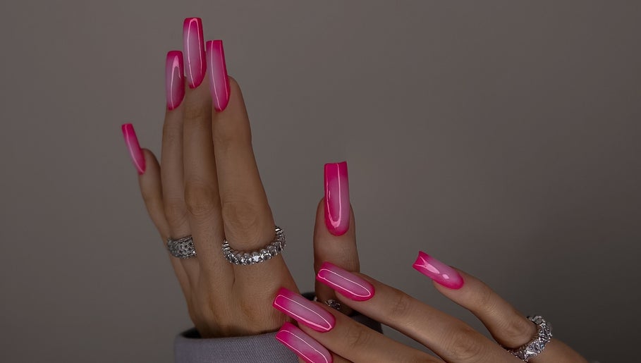 Pink ombre nails with silver rings at Koko the Nail Artist, Amman, Amman Governorate, JO.