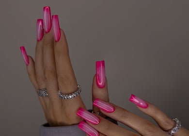 Pink ombre nails with silver rings at Koko the Nail Artist, Amman, Amman Governorate, JO.