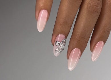 Elegant ombre nails with 3D butterfly art at Koko the Nail Artist, Amman, Amman Governorate, JO.