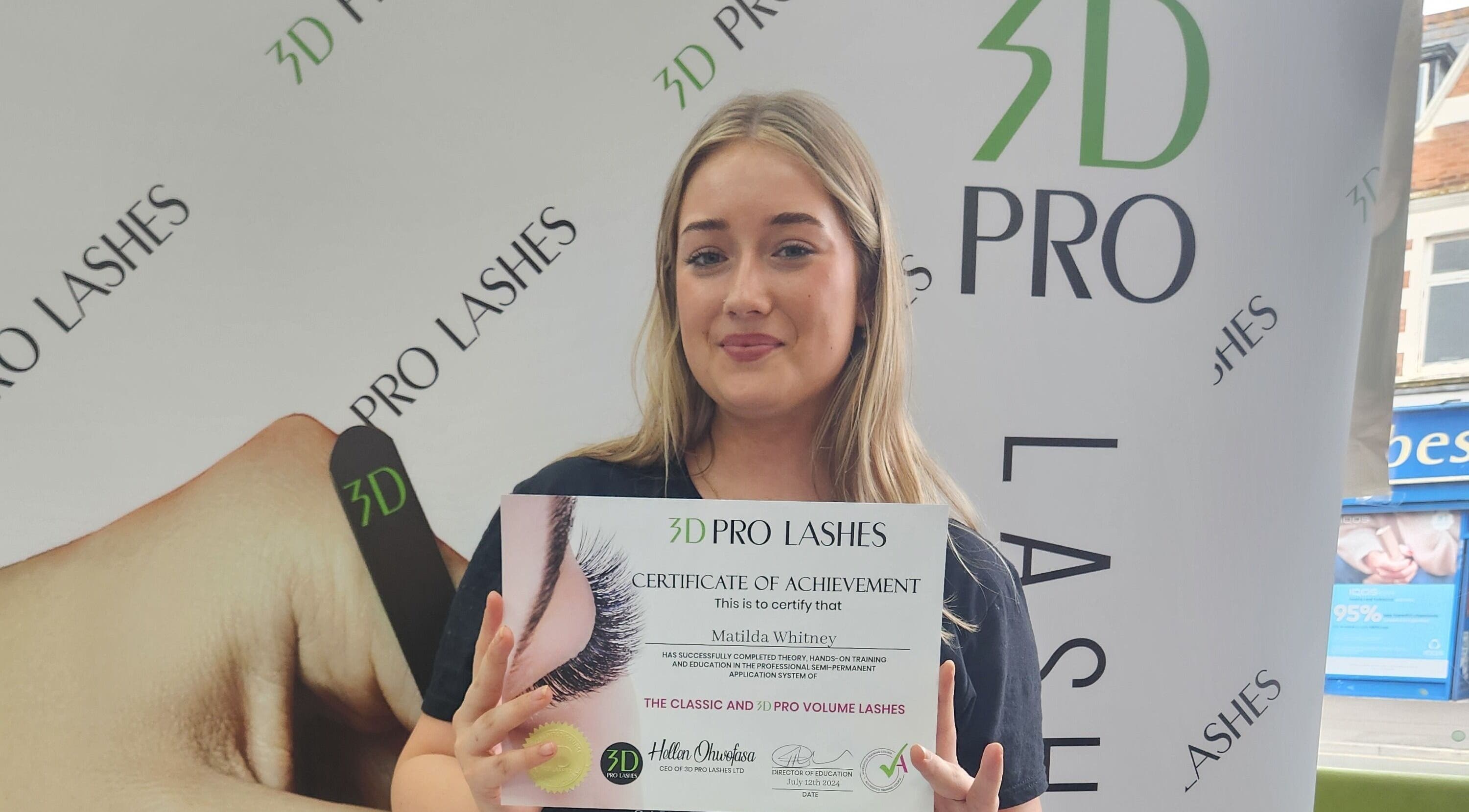 Student proudly displays certificate at 3D PRO LASHES ACADEMY in Bournemouth, England, GB.