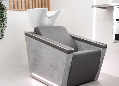 Modern hair wash station at Move Salon Inchicore, Dublin, County Dublin, IE, featuring sleek lines and gray tones.